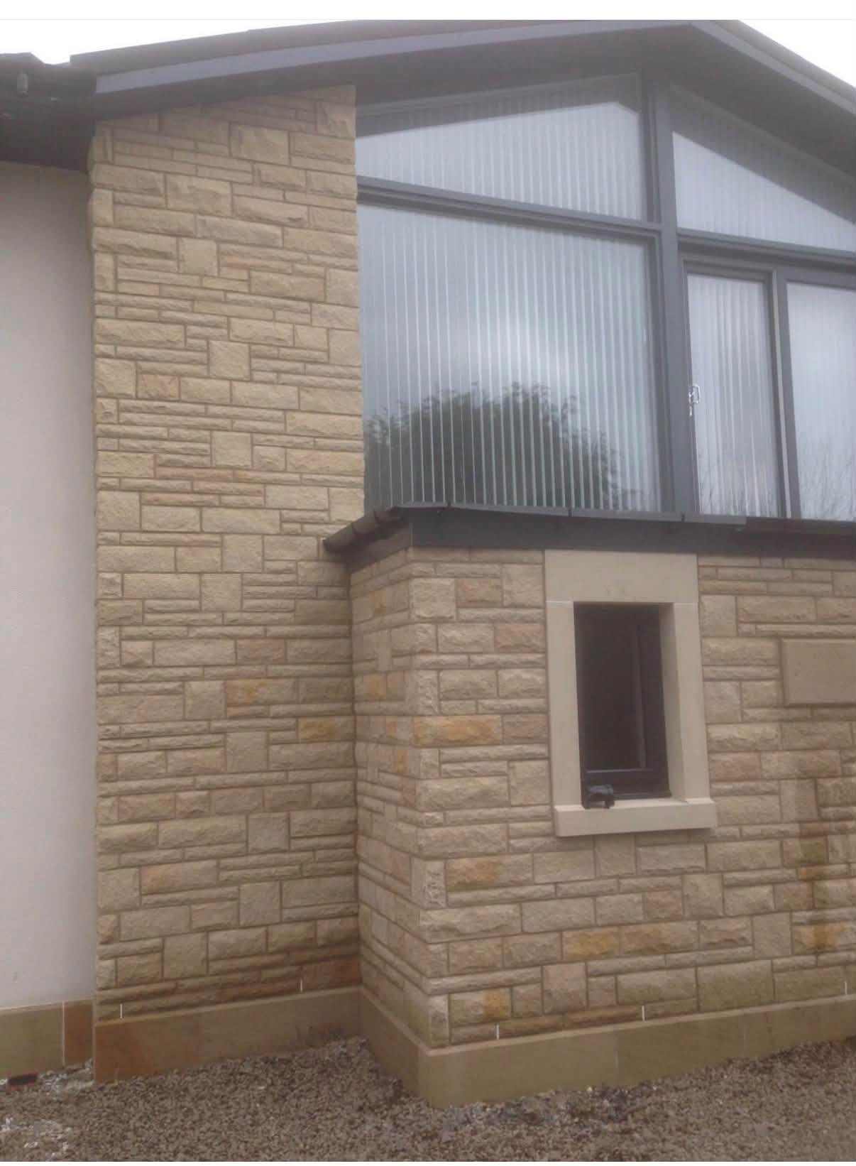 Glazed gable and timber double doors on the Johnstone new build