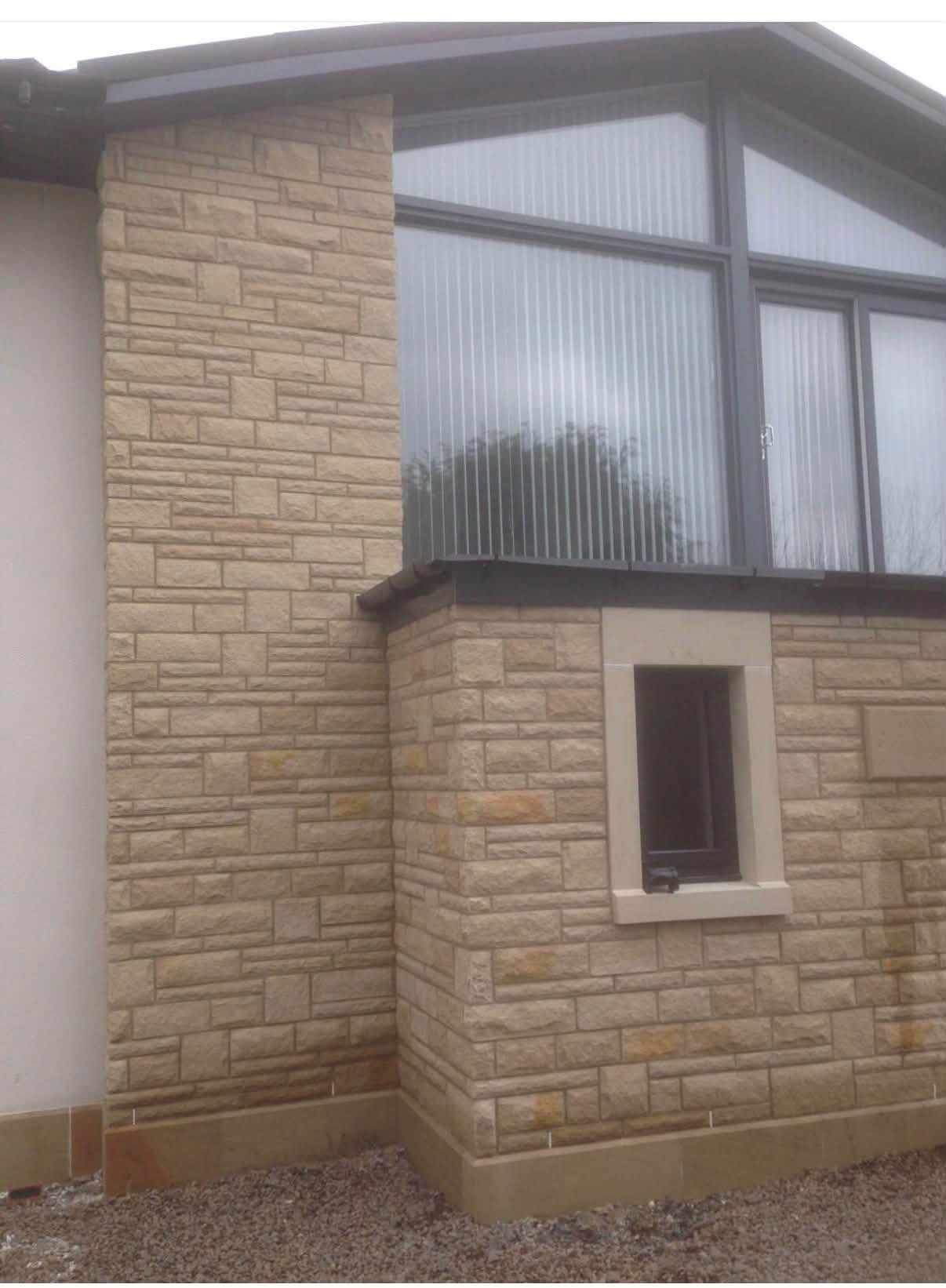 Glazed gable and timber double doors on the Johnstone new build