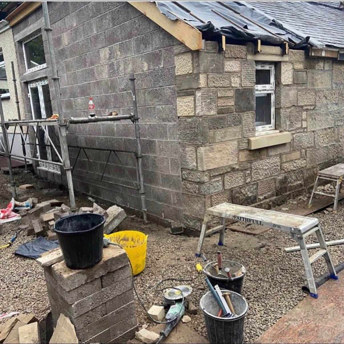 Stone front of the Bonkle extension, still in scaffold